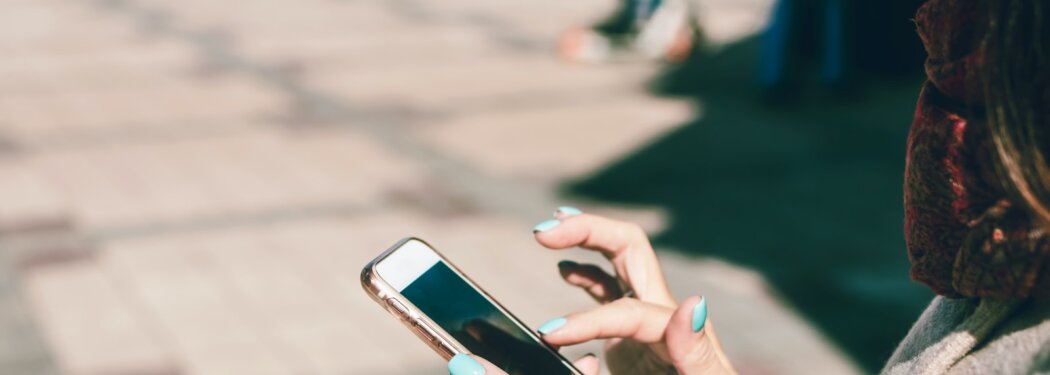 woman using smartphone