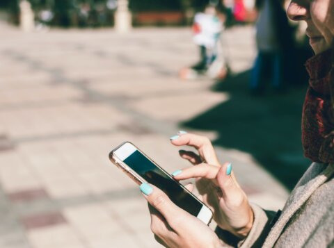 woman using smartphone