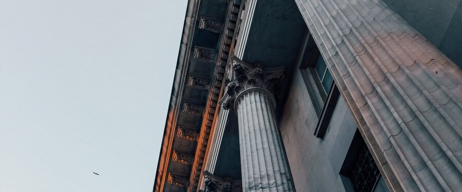 low angle photography of gray concrete building