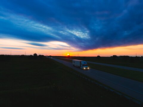 a sunset over a road