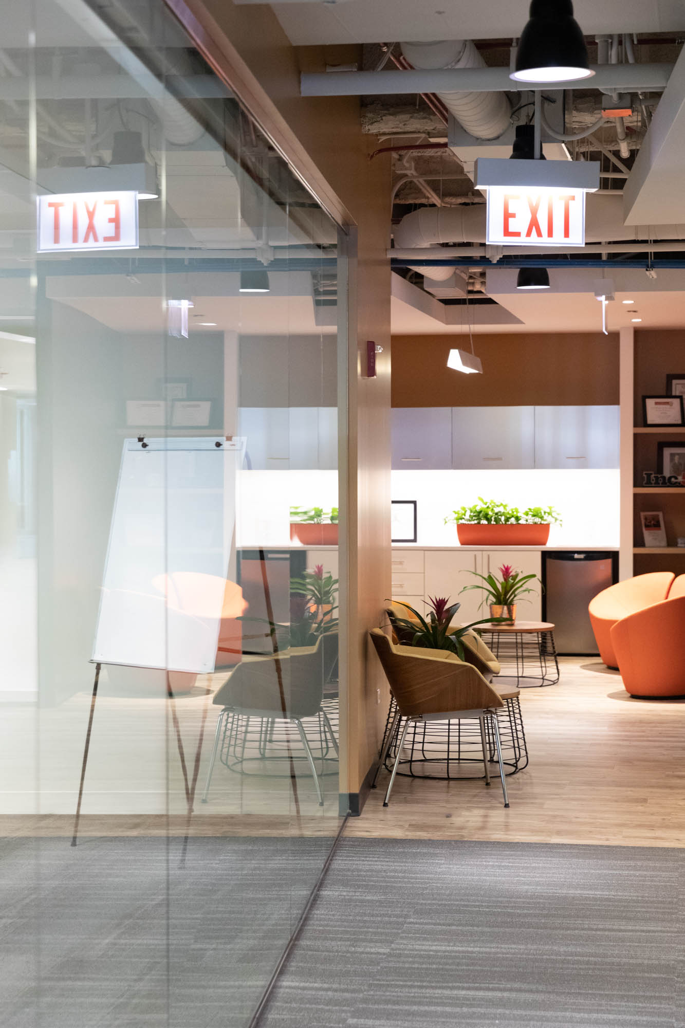 A hallway at AArete with an empty chair