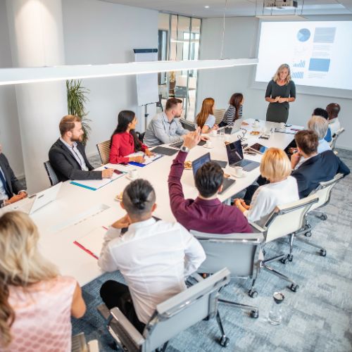 Is Your Health Plan Data AI ready 1 - AArete Business people sitting around a conference table