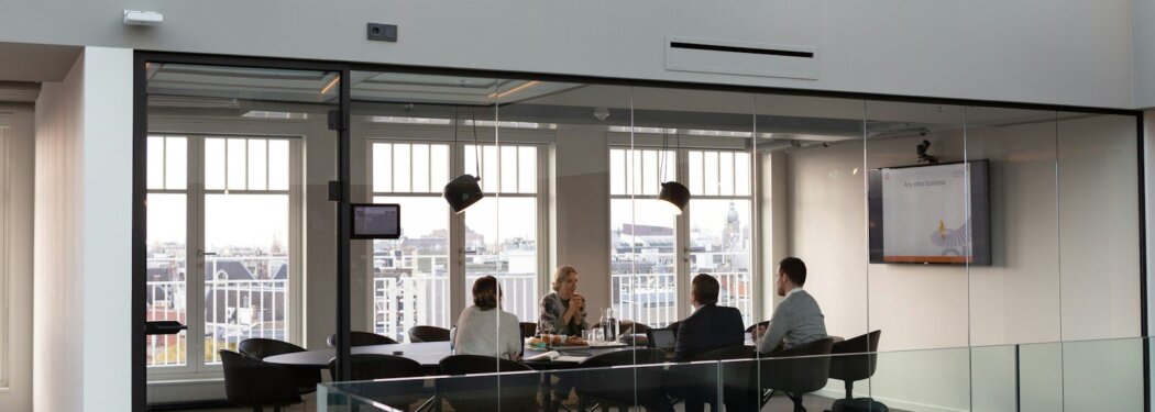 people sitting on chair inside building