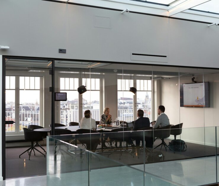 people sitting on chair inside building