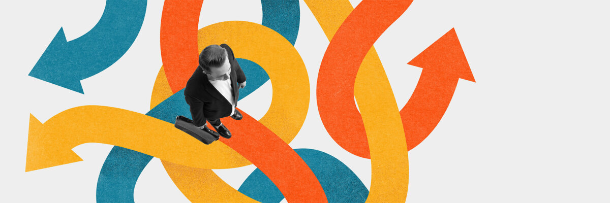 Businessperson in a suit walking with a briefcase through tangled blue, orange, and yellow arrows in a chaotic swirl