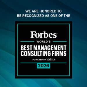 Award badge announcing Forbes World's Best Management Consulting Firms 2026, powered by Statista, on a teal-framed black square against a blue gradient background